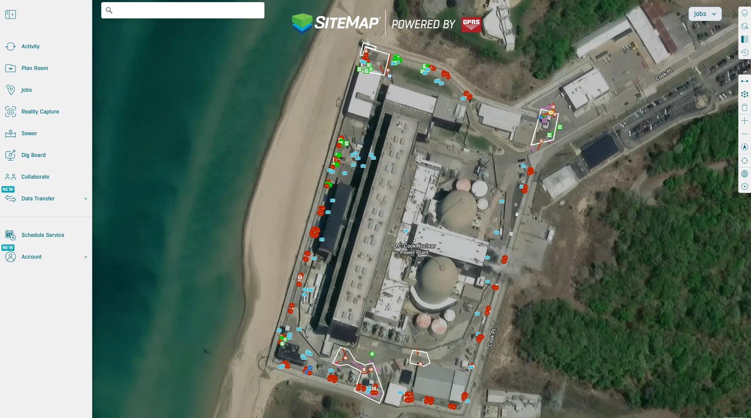 Digital facility map viewed in SiteMap® showing a coastal power plant with mapped underground utilities and planned security fence installation areas.