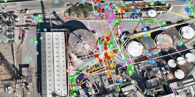Aerial industrial facility map with dense overlay of utility lines and data points